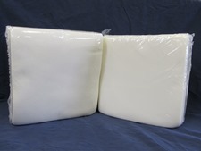 two packages of white cloth